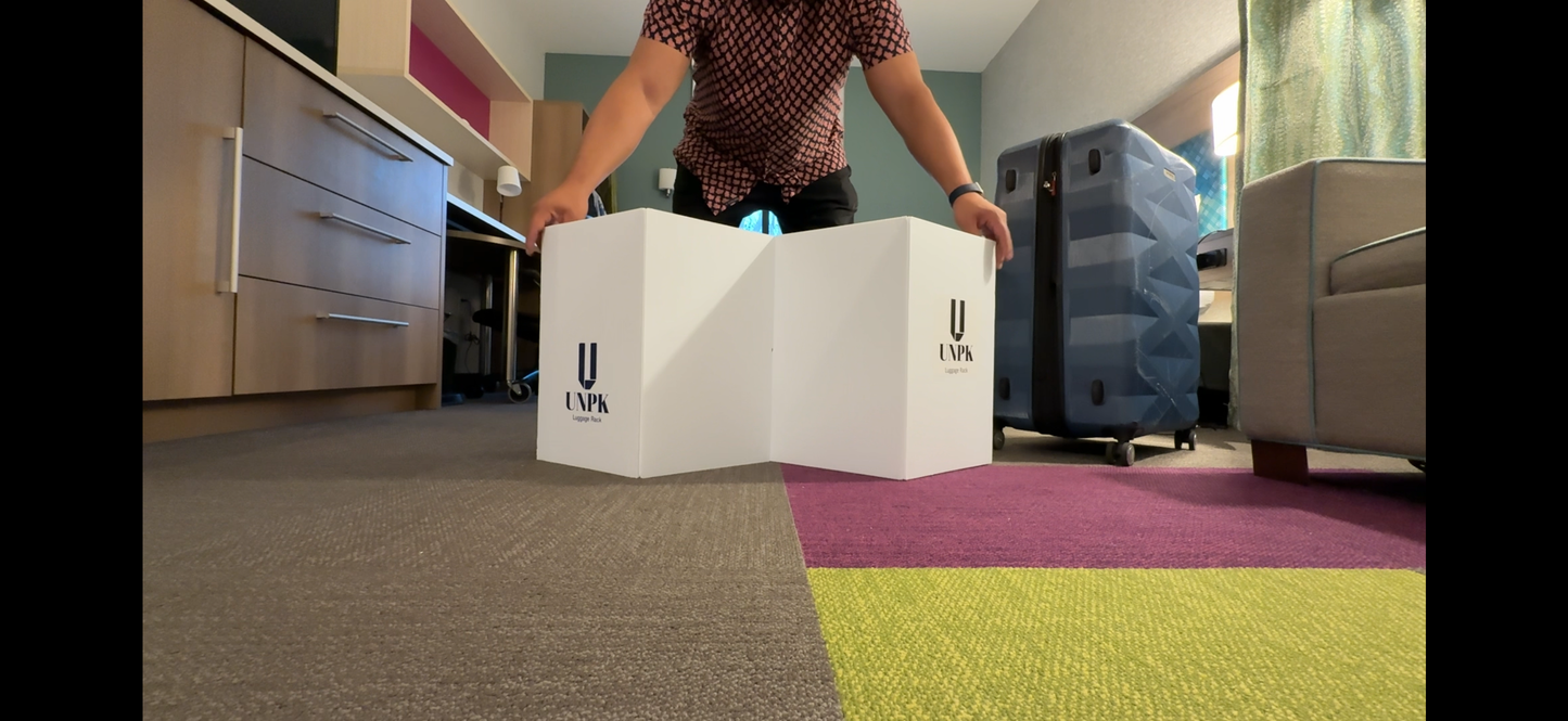 (2) UNPK Go - The Luggage Rack That Travels With You.
