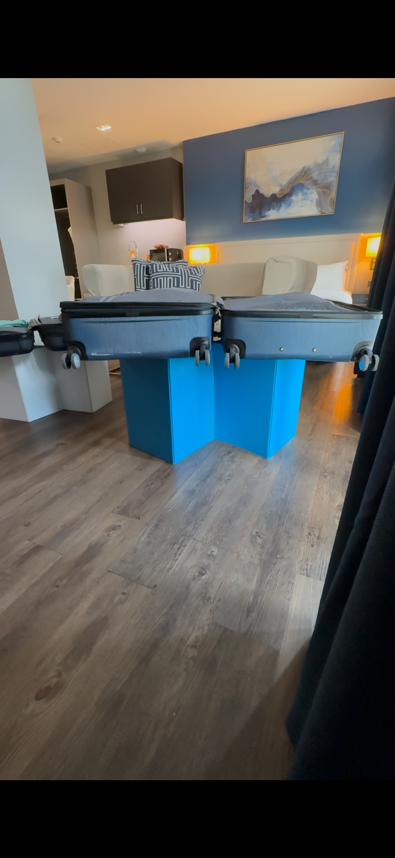 (2) UNPK Go - The Luggage Rack That Travels With You.